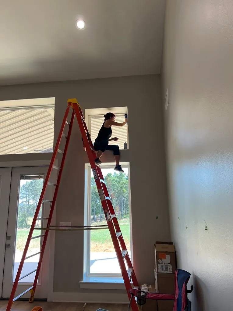 Out of the Ashes Cleaning Services team member on the job at a home or new construction site in East Texas, photo 1